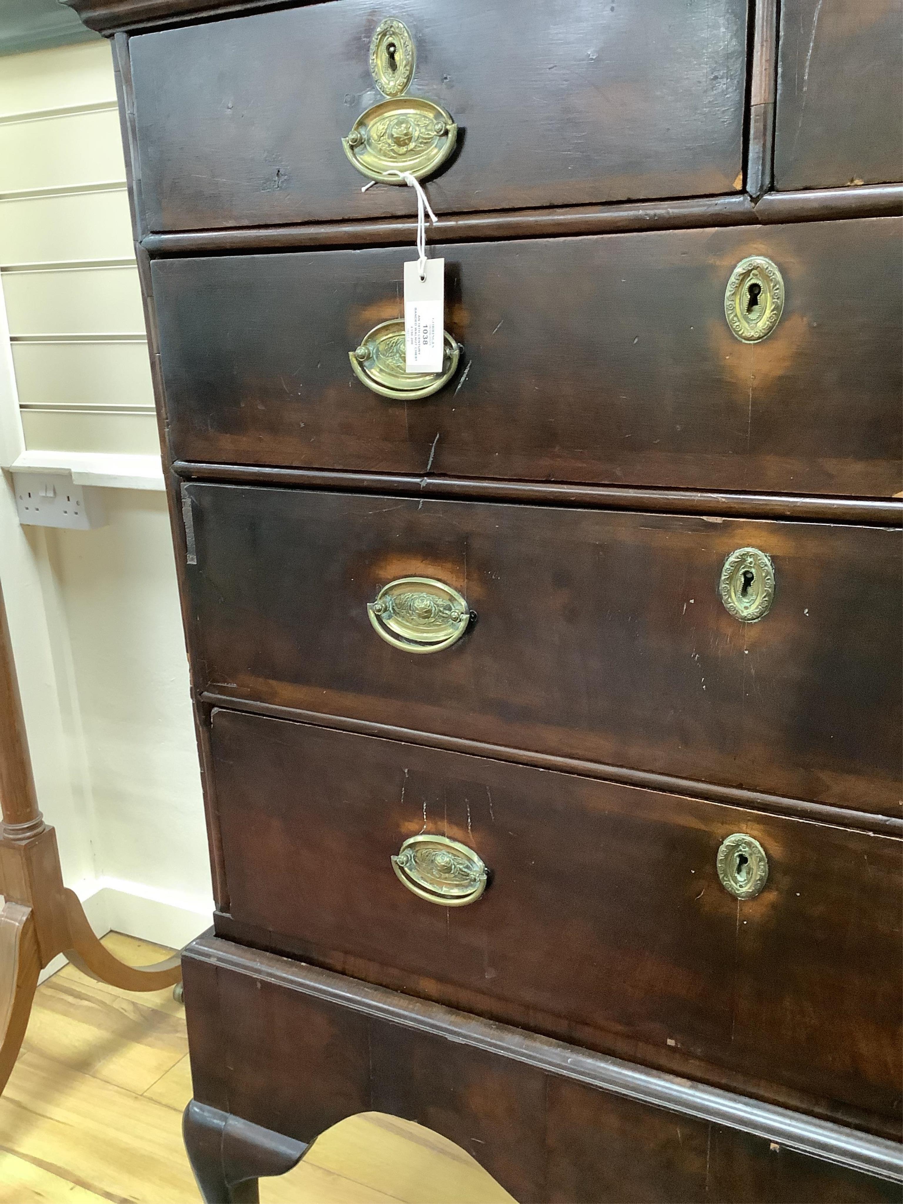 An 18th century banded walnut chest on stand, width 98cm, depth 54cm, height 131cm
